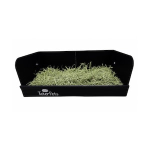 May include: A black rectangular pet hay feeder with high side walls and a low front edge. The front panel features the white text TaterPets with a small graphic of a rodent. The interior is filled with a layer of dried green hay for small animals.