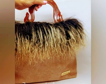 Handbag in velvet and alpaca.