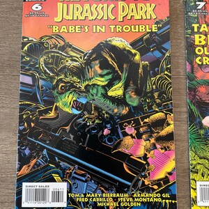May include: A comic book cover featuring a green dinosaur with yellow stripes attacking a car. The comic book is titled "Return to Jurassic Park" and the issue number is 6. The tagline is "Babe's in Trouble".