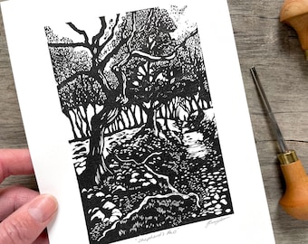 May include: Black and white woodcut print of a path through a grove of trees. The print is titled "Shepherd's Path".