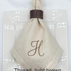 May include: A rustic wooden sign with the text "Welcome to our home" in white lettering. The sign features a distressed finish and a simple, inviting design, perfect for entryway decor.