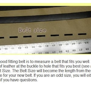 May include: A close-up of a black leather belt with multiple holes and a metal buckle. A ruler is visible below the belt, with the text "Belt size" written above the belt. The text below the image explains how to measure a belt for the correct size.