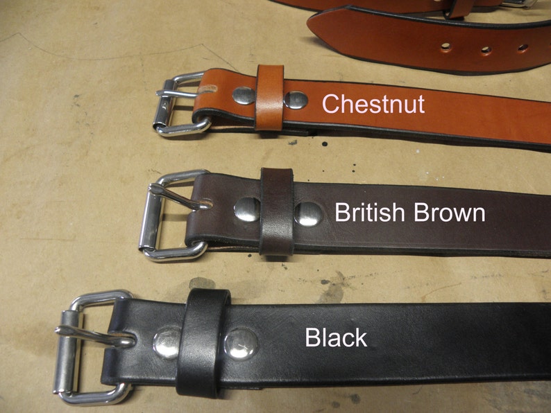 May include: Three leather belts with silver buckles in chestnut, British brown, and black.