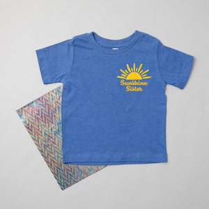 Sunshine Sister Matching Family Sibling Shirts. Sibling. Brother. Cousin. Toddler. Youth. First Trip Around the Sun Pocket Logo T-Shirt. image 5