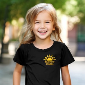 Sunshine Sister Matching Family Sibling Shirts. Sibling. Brother. Cousin. Toddler. Youth. First Trip Around the Sun Pocket Logo T-Shirt. image 4