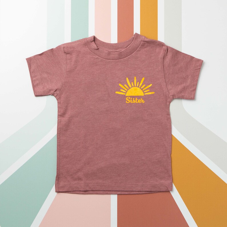 Sun Sister Matching Family Sibling Shirts. Sibling. Brother. Cousin. Toddler. Youth. First Trip Around the Sun Pocket Logo T-Shirt. image 7