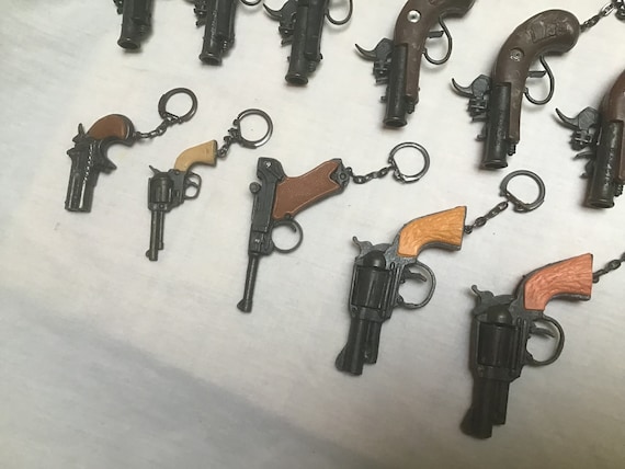 Plaquette derringer - Crosses poignées pistolets (13899995