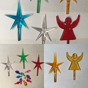 May include: Assortment of vintage Christmas tree toppers, including stars, angels, and a set of colourful bulbs. The toppers are made of plastic and have a variety of colours, including clear, blue, green, red, yellow, and gold.