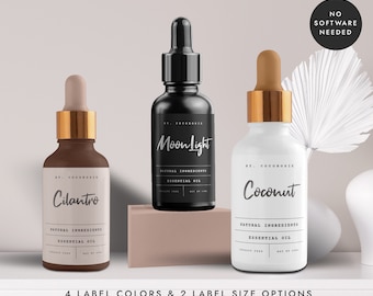 May include: Three glass bottles with gold caps and labels. The labels are white, black, and brown with the text "Cilantro", "Moonlight", and "Coconut". The bottles are labeled "Natural Ingredients Essential Oil".
