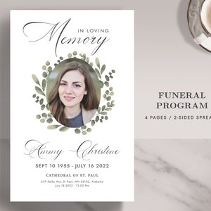 May include: Funeral program template with a green leafy wreath and a photo of a woman. The text reads "In Loving Memory Anmy Christine Sept 10 1955 - July 16 2022 Cathedral of St. Paul 239 Selby Ave, St Paul, MN 55102, Alabama July 18 2022 - 13:00 PM Funeral Program 4 Pages / 2-Sided Spreads"
