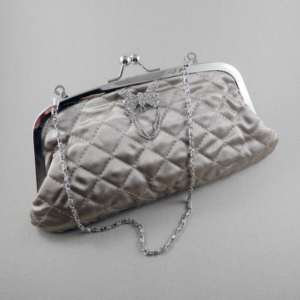 Quilted fabric beige evening purse with a decorative silver butterfly decoration, purse with silver chain, elegant evening clutch bag,