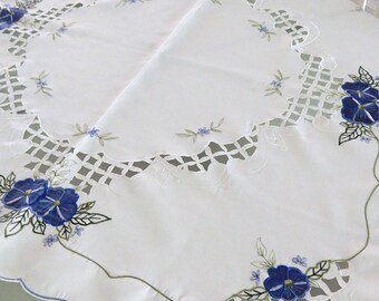 Small square vintage tablecloth blue embroidery flowers, cut away fabric and scalloped edges trimmed in blue.