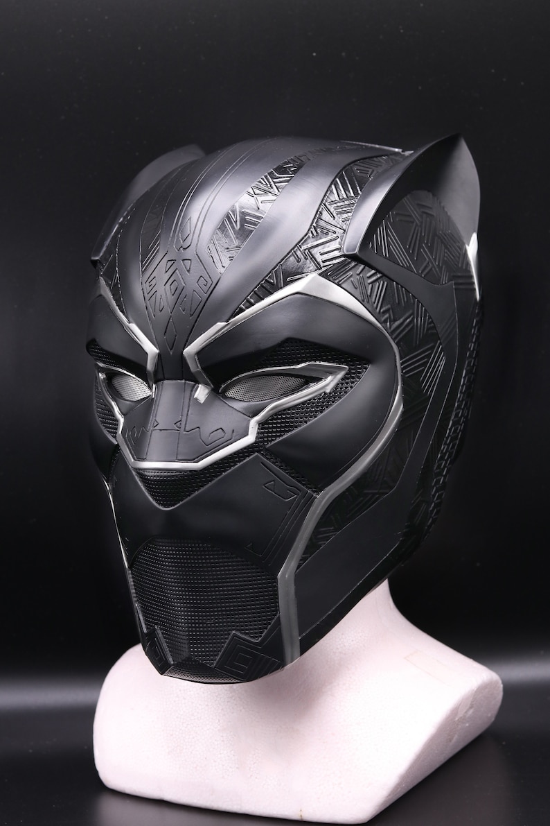 black panther holding helmet