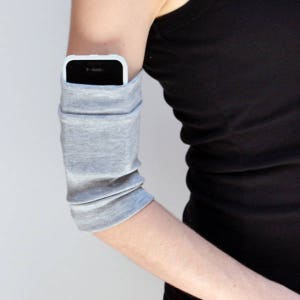 Brassards gris avec poches Brassards d'exercice Manchettes athlétiques Poignets gris Bracelets d'entraînement pour course à pied Support pour carte d'identité pour téléphone portable TRIXY XCHANGE