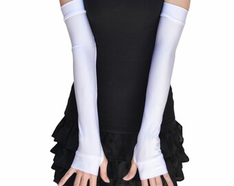 May include: A pair of white long fingerless gloves made of a silky material. The gloves extend to the elbow.