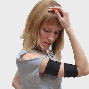 Brazaletes rojos Puños rojos para brazos Ataduras de spandex para brazos Cubrebrazos elásticos Ropa para roller derby Disfraz de cosplay Disfraz de superhéroe - TRIXY XCHANGE Negro