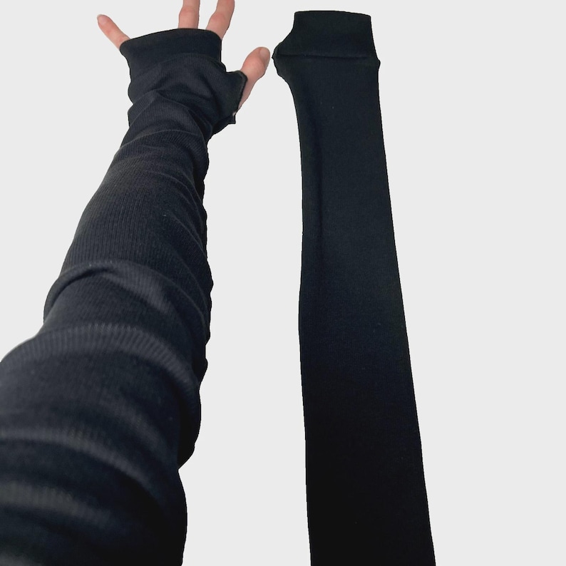 Lange Schwarze fingerlose Handschuhe Baumwollgewebe Rippenstrick Armstulpen Weiße Armstulpen Armstulpen Armstulpen Armstulpen TRIXY XCHANGE Bild 1