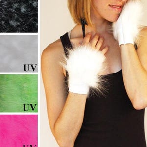 May include: A pair of white fingerless faux fur gloves with a soft, long-pile texture and a fitted cuff. The image also displays color swatches of the same faux fur material in black, white, neon green, and neon pink, with UV labels on some.