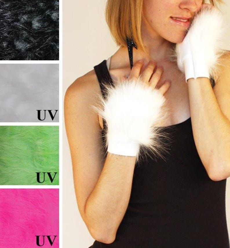 May include: A pair of white fingerless faux fur gloves with a soft, long-pile texture and a fitted cuff. The image also displays color swatches of the same faux fur material in black, white, neon green, and neon pink, with UV labels on some.