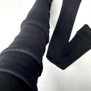 Lange Schwarze fingerlose Handschuhe Baumwollgewebe Rippenstrick Armstulpen Weiße Armstulpen Armstulpen Armstulpen Armstulpen TRIXY XCHANGE Bild 4