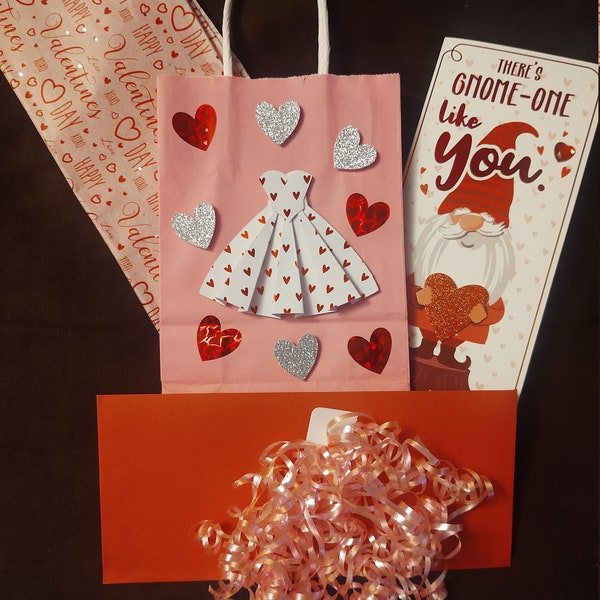 Complete gift bag set including personalized bag, matching pinback pin, tissue paper, greeting card, and bow for any occasion