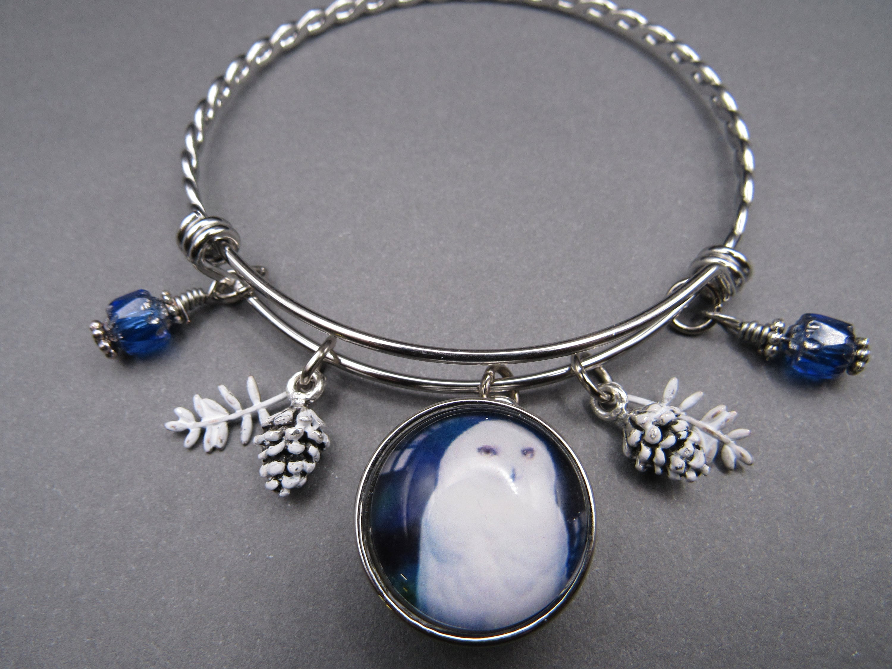 Snow Owl Charm Bangle Bracelet: Pinecone & Blue Cathedral Beads