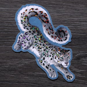 Léopard des neiges - Sticker vinyle scintillant arc-en-ciel