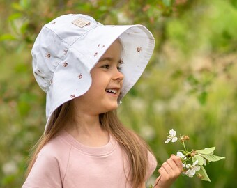 A hat with a brim for children for summer, made of cotton