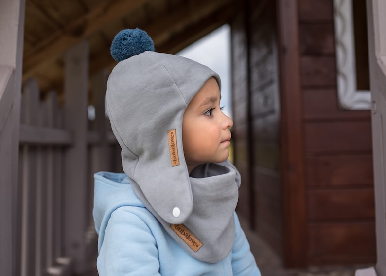 SET. Children's winter cap with a pompom and scarf Grey + blue pompom