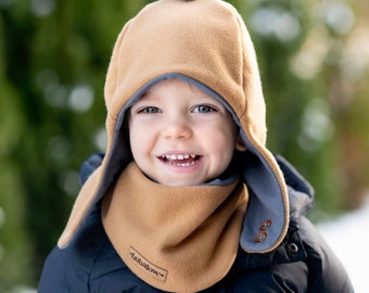 SET. Children's winter wool pilot cap with scarf .