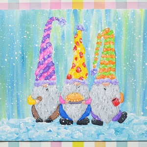May include: Three gnomes with colorful hats stand in a snowy scene. The gnome on the left holds a cookie, the middle gnome holds a pie, and the gnome on the right holds a cup of coffee. The background is a light blue with white snow.