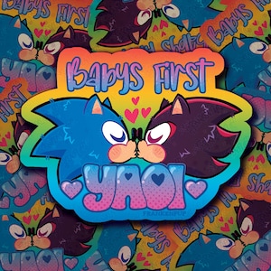 May include: A sticker featuring two cartoon hedgehogs kissing, with the text "BABYS FIRST YAOI". The sticker has a rainbow gradient background and is surrounded by a pattern of similar images.