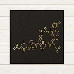 May include: A black canvas print with a gold metallic design of a complex chemical structure. The design is reminiscent of a molecule or a scientific diagram.