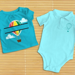 以下が含まれることがあります： 熱気球のデザインが施されたベビー服2着。1つは、カラフルな熱気球と名前を入れるための空白スペースのある青い半袖Tシャツ。もう1つは、単一の熱気球が付いた薄い青色のボディースーツです。