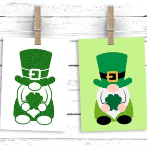 May include: Two images of a green leprechaun gnome holding a shamrock. The gnome is wearing a green hat with a gold buckle. The first image is a silhouette of the gnome with a glitter texture. The second image is a solid green gnome with a green background.