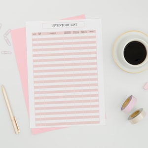 May include: A printable inventory list with columns for date, item number, product, starting quantity, total sold, remaining, and price. The list is on a white surface with a pink folder, a gold pen, two rolls of washi tape, a gold paper clip, and a cup of coffee.