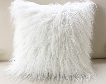 white fuzzy pillow