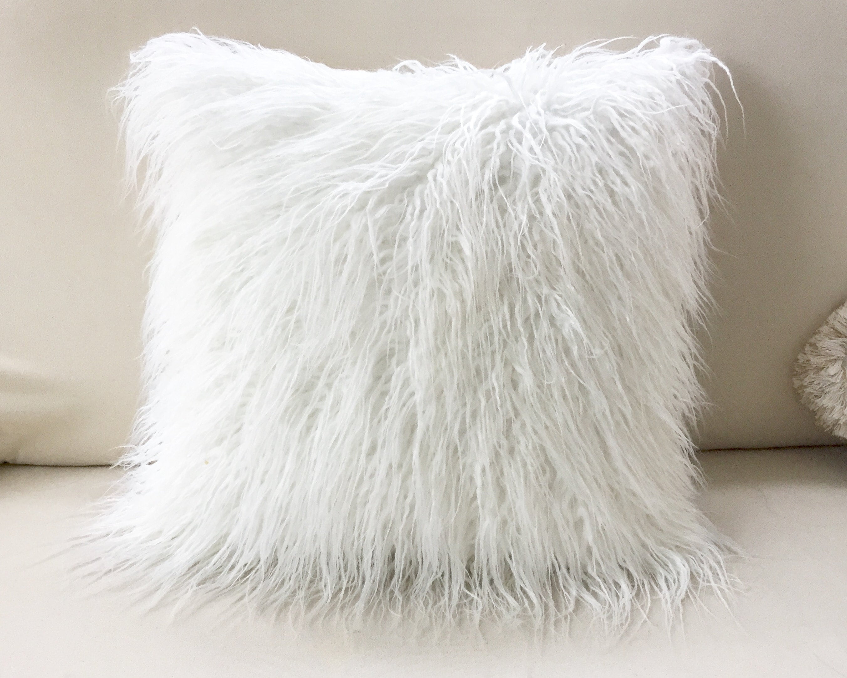 white faux pillows