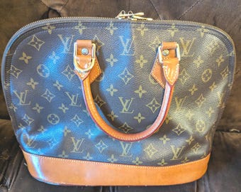 Authentic Louis Vuitton Alma Handbag