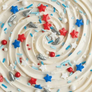 High resolution flat lay of sprinkle mix featuring silver rockets, blue jimmies, red stars, and white sugar pearls. Luxury Birthday Sprinkles Custom Sprinkles Cake Sprinkles Cupcake Décor Rocket Birthday Décor Space Sprinkles