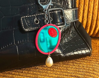 Ciondolo decorativo per borsa color oliva