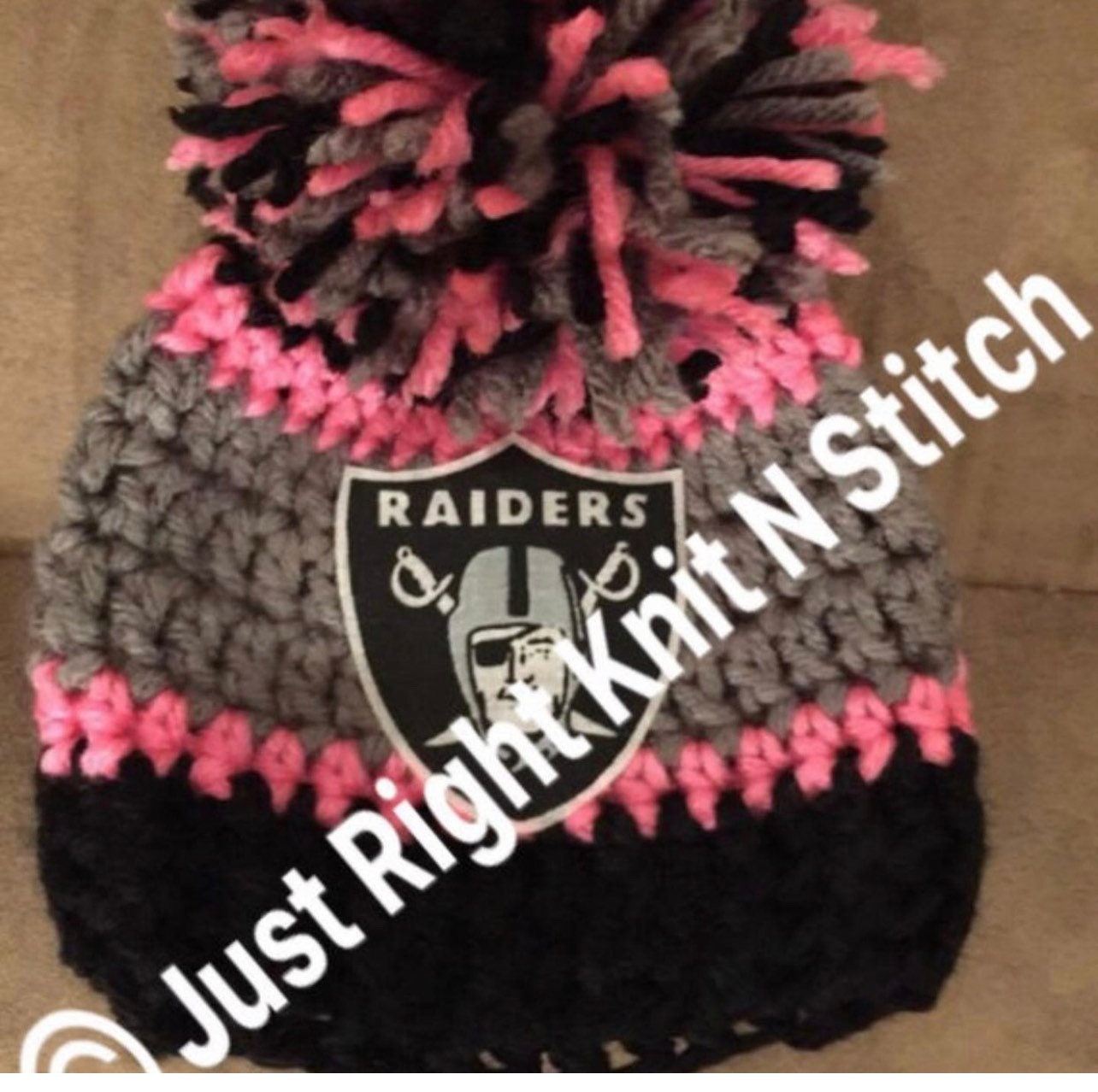 pink raiders beanie