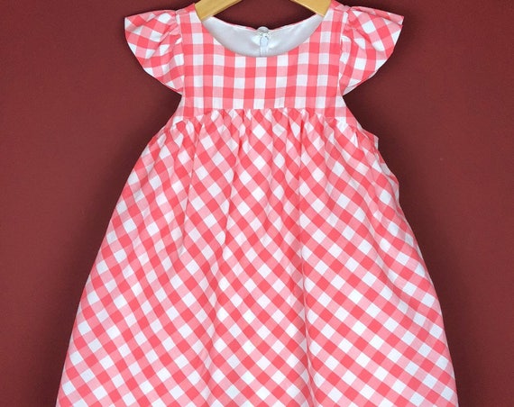 The "Flutter-By Dress" in Salmon Gingham.