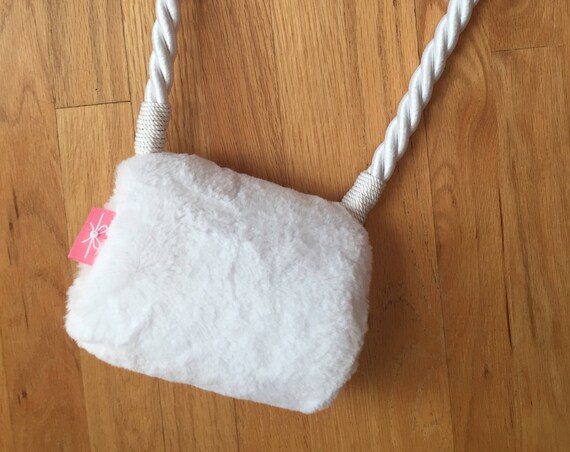 The "Vegan Muff" in White Faux Fur.