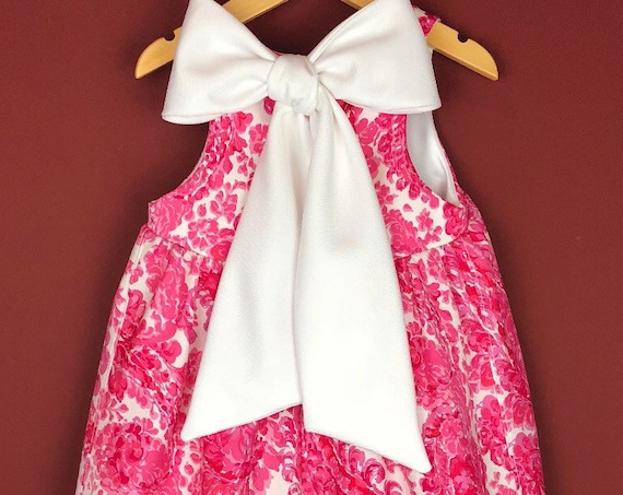 The "Bow-Backed Dress" in Pink Paisly.