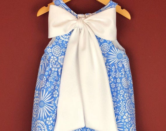 The "Bow-Backed Dress" in Graphic Blue Floral.