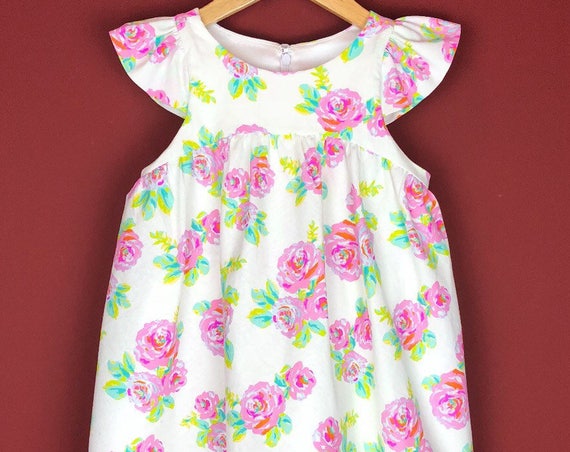 The "Flutter-By Dress" in Neon Rose.