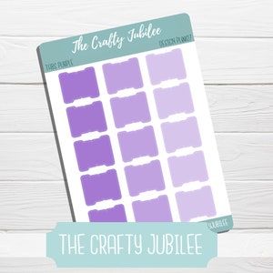 May include: A sheet of purple planner stickers from The Crafty Jubilee. The stickers are tab-shaped in varying shades of purple. The sheet has the text "TABS PURPLE" and "DESIGN PLAN 07". The Crafty Jubilee logo is at the bottom.