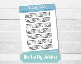 May include: A white sticker sheet featuring seven individual sleep tracker labels with black borders and text. Each label includes the text Sleep Tracker and two rows of numbered boxes from one to twelve. The top of the sheet displays The Crafty Jubilee.
