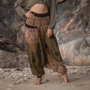 green and bronze low crotch harem trousers with circle mandala pattern.